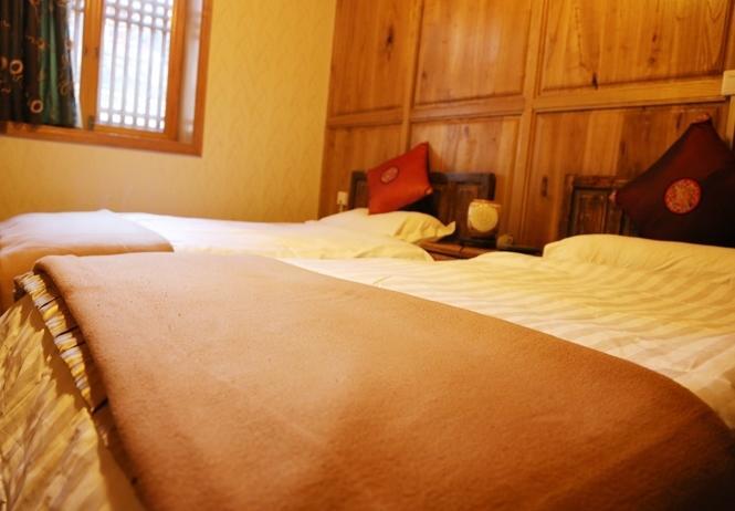 Li Dao Yuan Aparthotel Lijiang  Rum bild