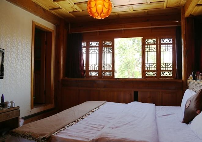 Li Dao Yuan Aparthotel Lijiang  Rum bild