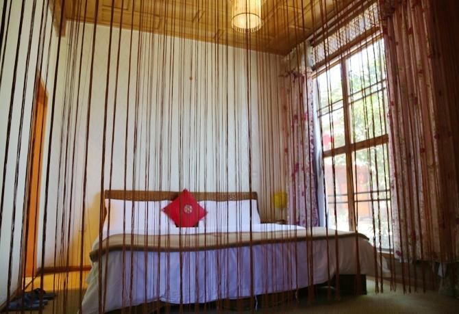 Li Dao Yuan Aparthotel Lijiang  Rum bild